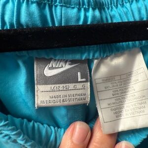 Teal Nike shorts size L